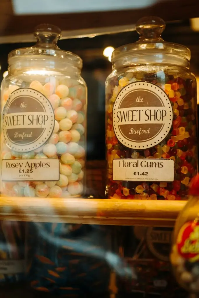 Assortment of traditional Old English sweets in glass jars, retro confectionery display