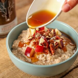 Display of colourful, stacked high-sugar novelty marzipan sweets shaped like cupcakes, fries, and lemons.
