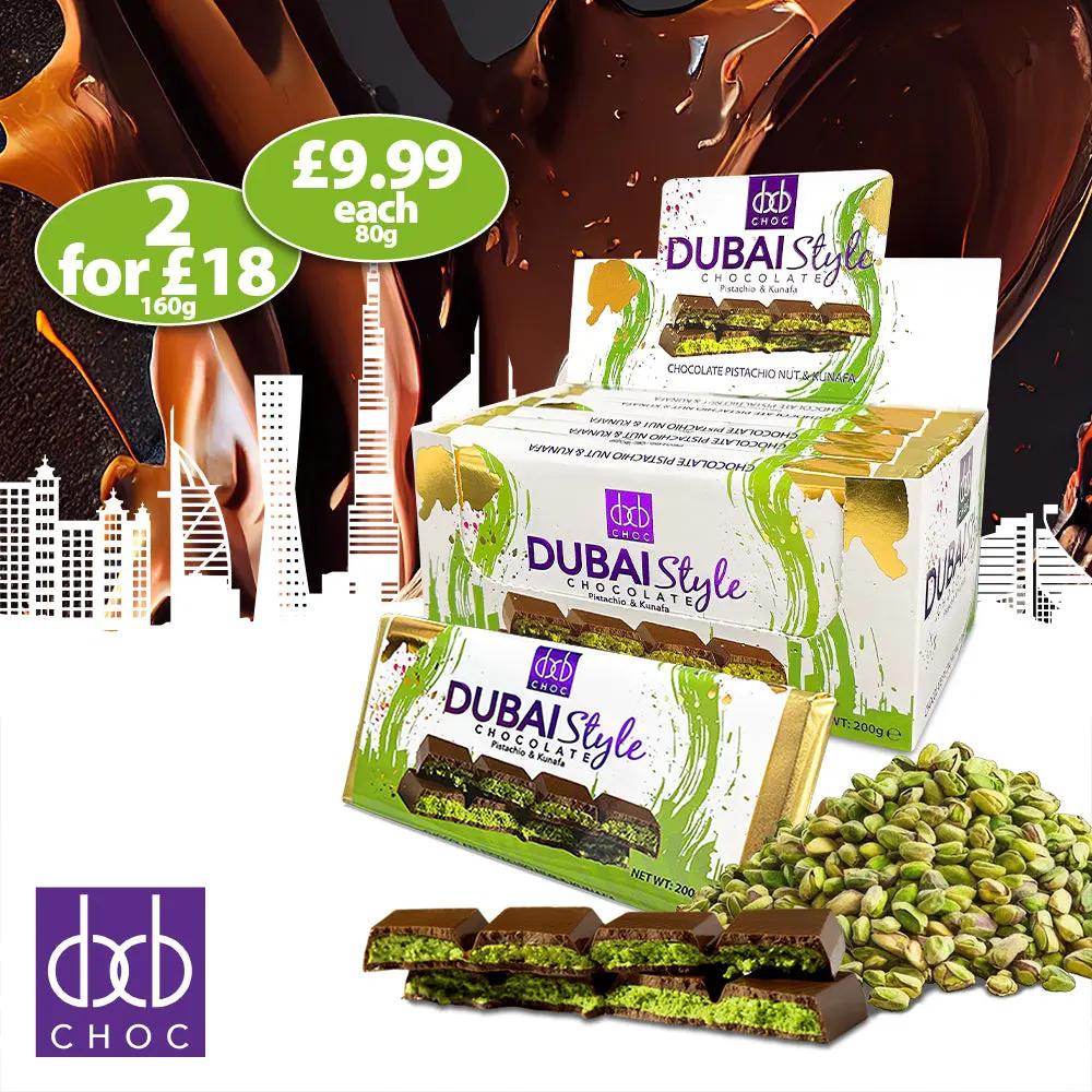 Dubai Style Chocolate Pistachio Nut Bars with green pistachio filling and dark chocolate coating, surrounded by pistachios and melted chocolate splashes.
